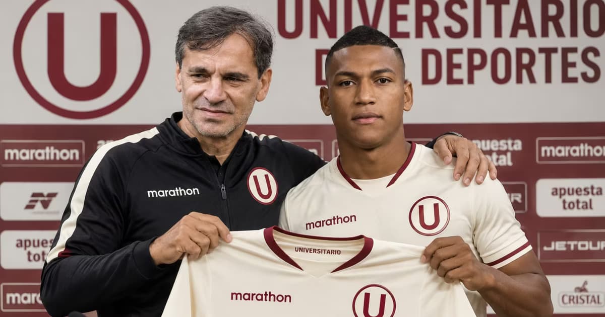 Fabián Bustos y Carlos Gruezo en Universitario