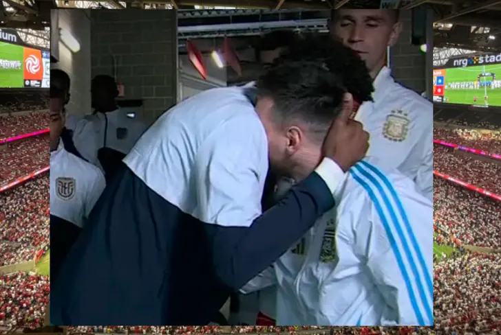 Abrazo Alexander Domínguez y Lionel Messi